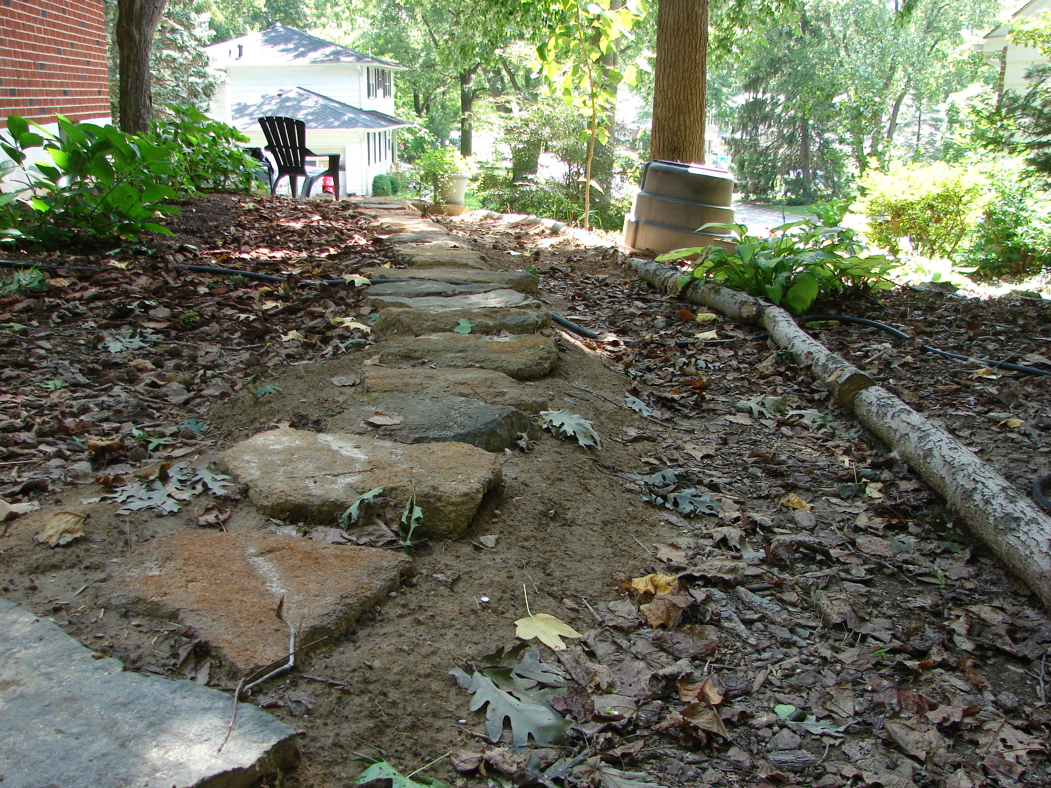 west side yard, facing south, stepping stones with mulch 4
